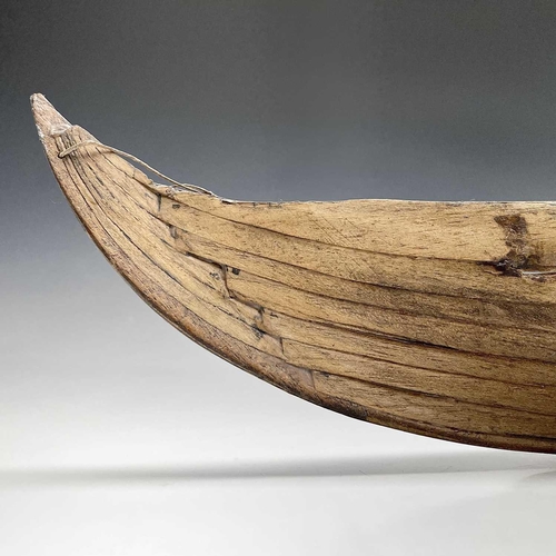 169 - A wood model of a whaleboat, length 67cm width 16cm.