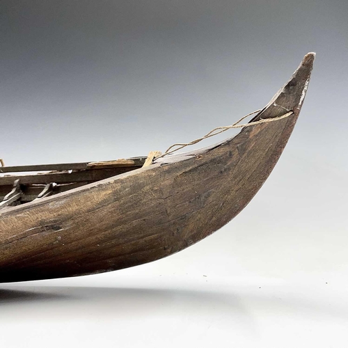 169 - A wood model of a whaleboat, length 67cm width 16cm.