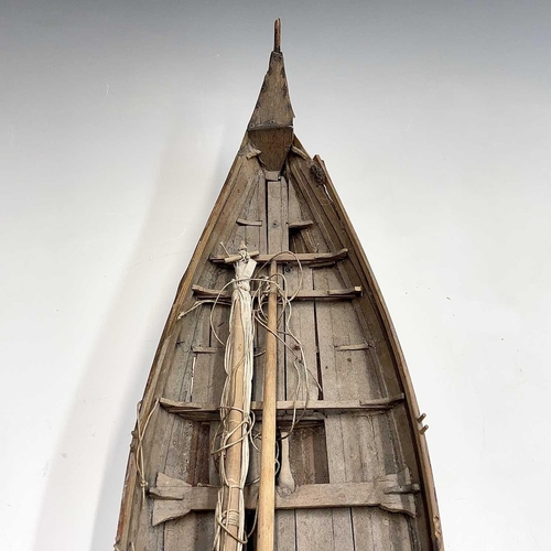 169 - A wood model of a whaleboat, length 67cm width 16cm.