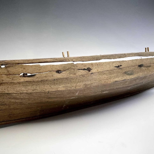 169 - A wood model of a whaleboat, length 67cm width 16cm.