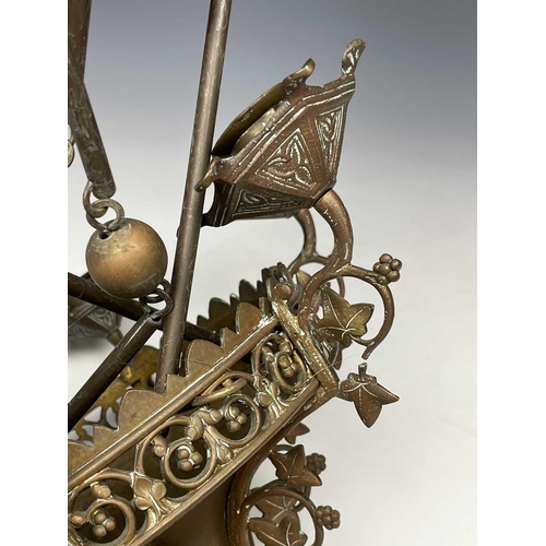 171 - A late 19th/early 20th century brass hanging six branch chandelier, cast with ivy leaves. Approximat... 