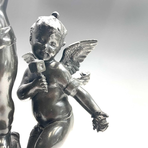 29 - After Rousseau, a bronze group of three cherubs, early 20th century, emblematic of art, music and sc... 