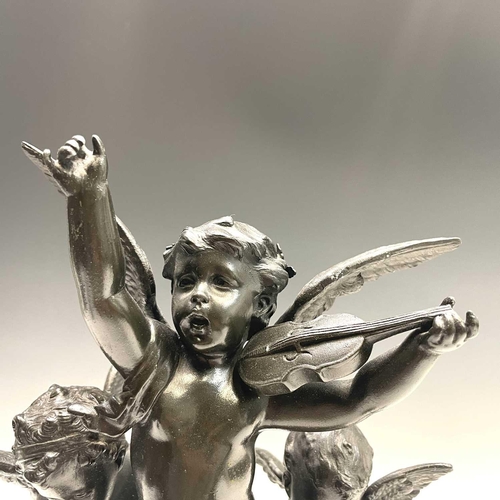 29 - After Rousseau, a bronze group of three cherubs, early 20th century, emblematic of art, music and sc... 