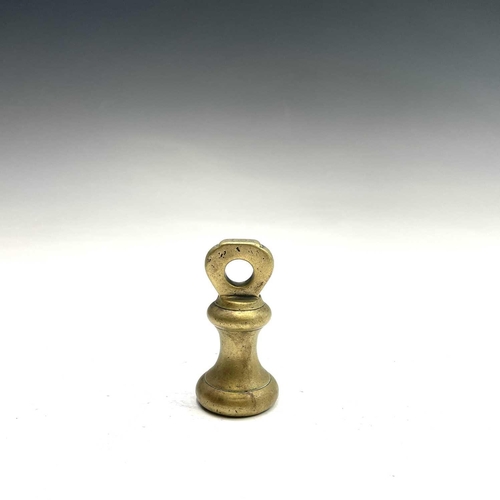 31 - A set of five Victorian brass bell weights.