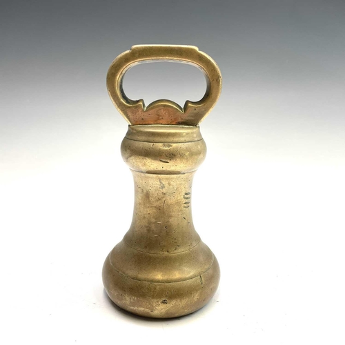 31 - A set of five Victorian brass bell weights.