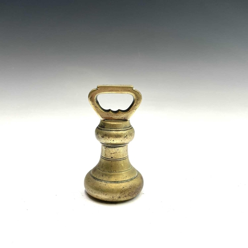 31 - A set of five Victorian brass bell weights.