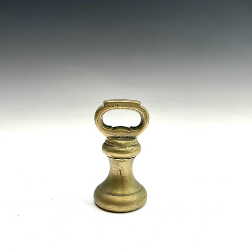 31 - A set of five Victorian brass bell weights.