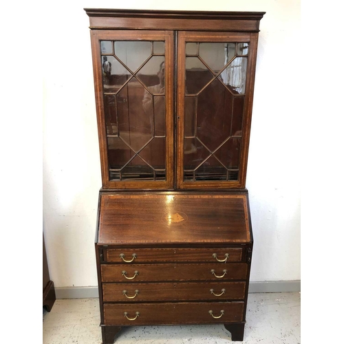 3201 - An Edwardian mahogany and satinwood banded bureau bookcase, with glazed upper section, the lower par... 