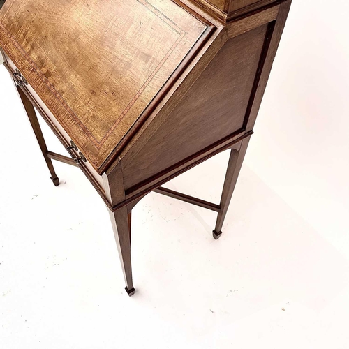 3204 - A 20th century mahogany crossbanded bureau the fall front enclosing a fitted interior above a single... 