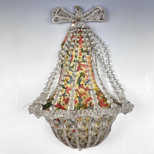 34 - A glass basket form wall light bracket, circa 1920, with mirror back and pendant, flowerhead and loz... 