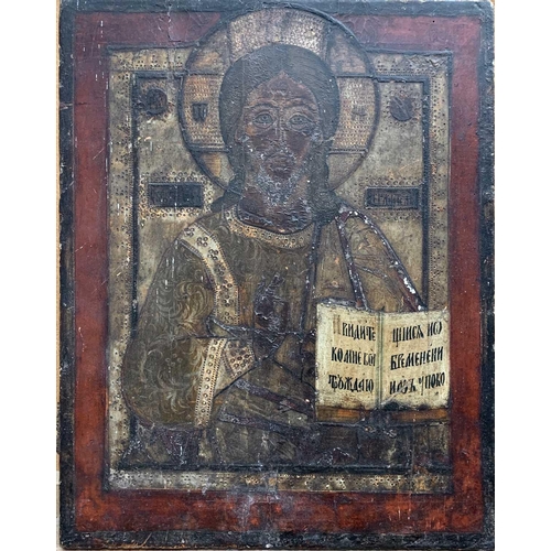 348 - A Russian large icon of Christ Pantocrator, 18th century, holding a book in his left hand, 44 X 35cm... 