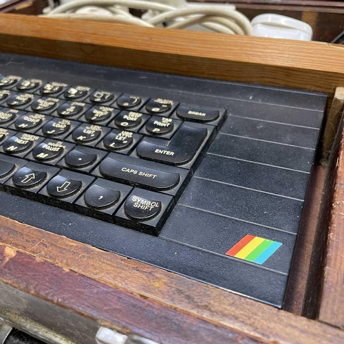 349 - ZX Spectrum 48K in original box with power adapter, a ZX Spectrum+ with power adapter mounted into a... 