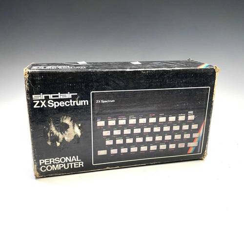 349 - ZX Spectrum 48K in original box with power adapter, a ZX Spectrum+ with power adapter mounted into a... 