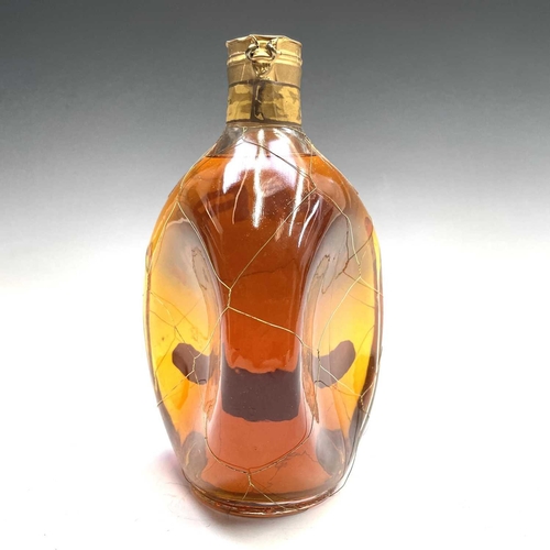 353 - Haig's Dimple Scotch whisky circa 1950 in presentation box together with a smaller bottle and a mini... 