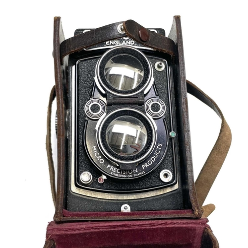 354 - Microcord Twin Reflex camera in leather case with original box.