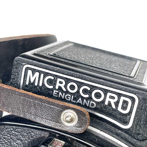 354 - Microcord Twin Reflex camera in leather case with original box.