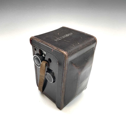 354 - Microcord Twin Reflex camera in leather case with original box.