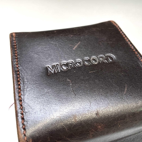 354 - Microcord Twin Reflex camera in leather case with original box.