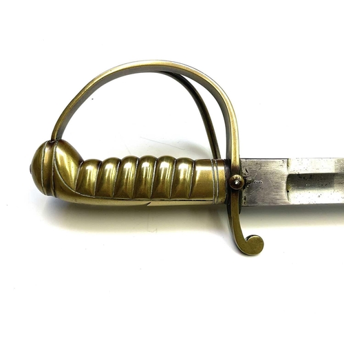 357 - A German sword, mid 19th century, with solid brass grip and curved guard, the blade stamped a crown ... 