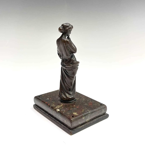 37 - A bronze figure of a Classical maiden, late 19th century, on a Cornish serpentine rectangular base, ... 