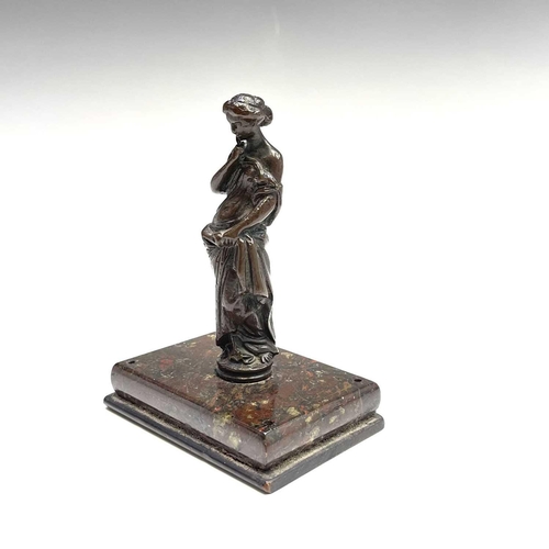 37 - A bronze figure of a Classical maiden, late 19th century, on a Cornish serpentine rectangular base, ... 