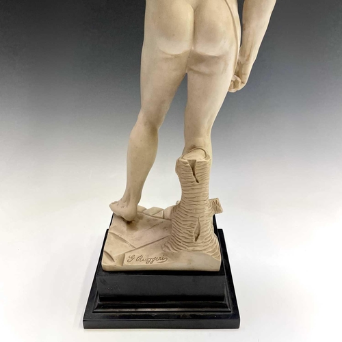 40 - A composite marble statue of Michelangelo's David on a marble base by G Ruggeri signed, height 72cm.