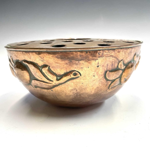 41 - A Newlyn copper rose bowl, with pierced top, repousse decorated with medlars, stamped mark, diameter... 