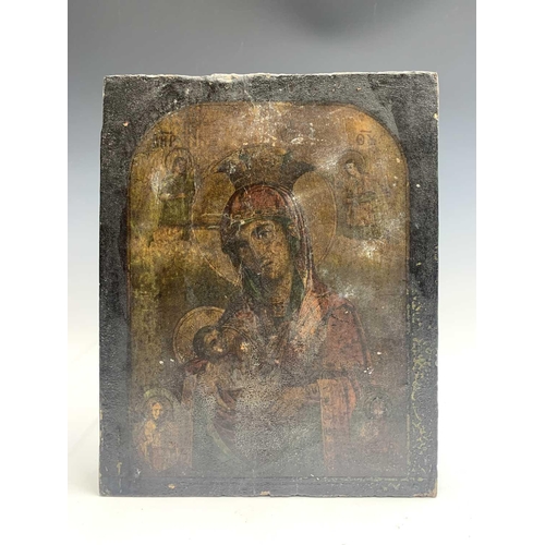 45 - A Russian icon, 19th century, of The Holy Mother and infant child with four saints, height 27cm, wid... 