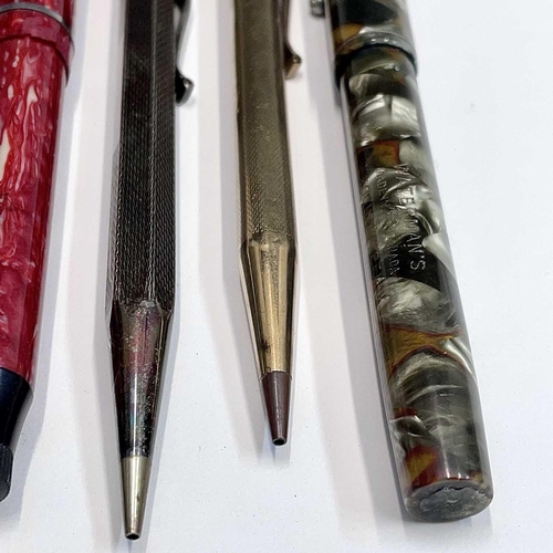 54 - A Watermans fountain pen, three others, a silver Yard-o-led pencil and two others (7).