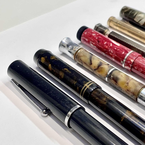 54 - A Watermans fountain pen, three others, a silver Yard-o-led pencil and two others (7).