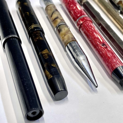 54 - A Watermans fountain pen, three others, a silver Yard-o-led pencil and two others (7).