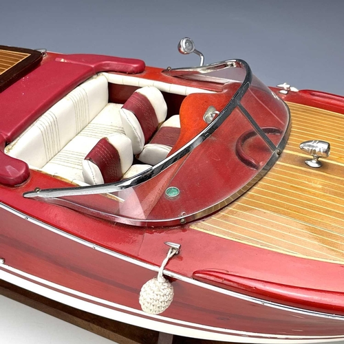 58 - A well made Riva Aquarama model speedboat with remote control and accessories including fitted stand... 