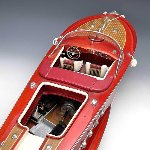 58 - A well made Riva Aquarama model speedboat with remote control and accessories including fitted stand... 