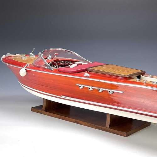 58 - A well made Riva Aquarama model speedboat with remote control and accessories including fitted stand... 