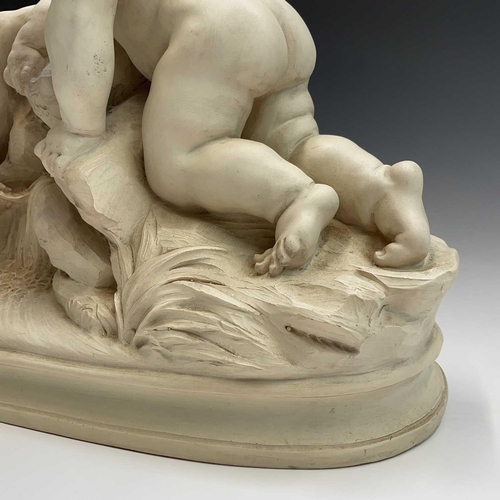 72 - A large oval composite resin figure group of putti resting at a cascade, height 46cm width 61cm dept... 