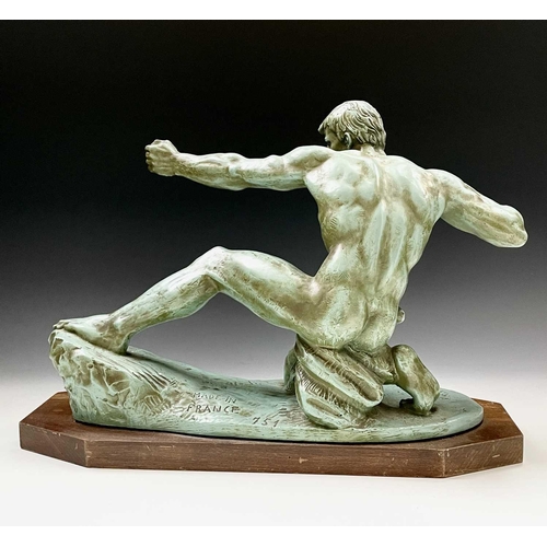 73 - An Art Deco plaster sculpture of a male archer signed Risault on an octagonal wooden base, height 37... 