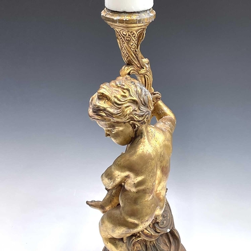 80 - A giltwood gesso figure of putto holding a cornucopia, height 70cm diameter 25cm.