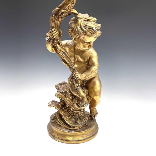 80 - A giltwood gesso figure of putto holding a cornucopia, height 70cm diameter 25cm.