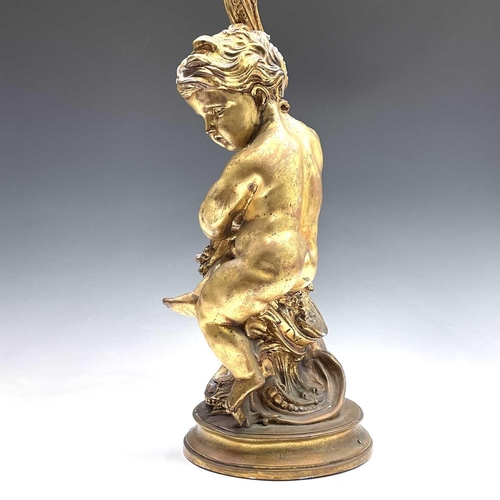 80 - A giltwood gesso figure of putto holding a cornucopia, height 70cm diameter 25cm.