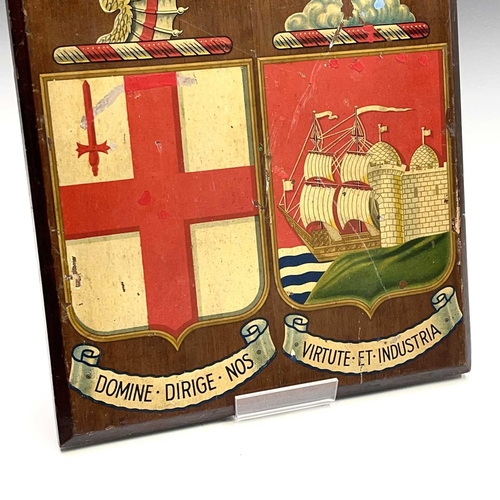 81 - A small walnut panel, hand painted with two crests associated with the GWR, height 34.5 X 28cm, poss... 