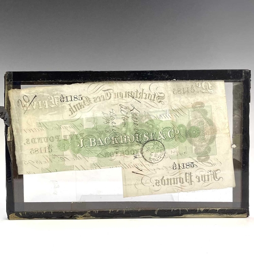 82 - A Durham bank £5 note, dated 1891, cut cancelled, 10.5 X 20.5cm and a similar Stockton on Tees bank ... 