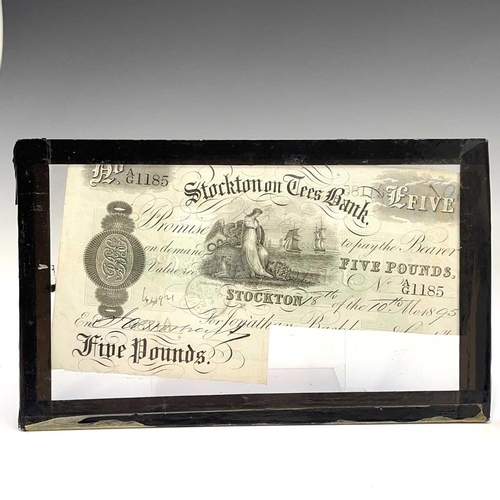 82 - A Durham bank £5 note, dated 1891, cut cancelled, 10.5 X 20.5cm and a similar Stockton on Tees bank ... 