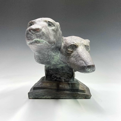 91 - A heavy bronzed composition sculpture of a pair of greyhound heads, on a plinth base. Height 29cm, w... 