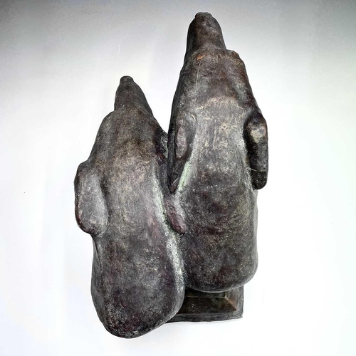 91 - A heavy bronzed composition sculpture of a pair of greyhound heads, on a plinth base. Height 29cm, w... 