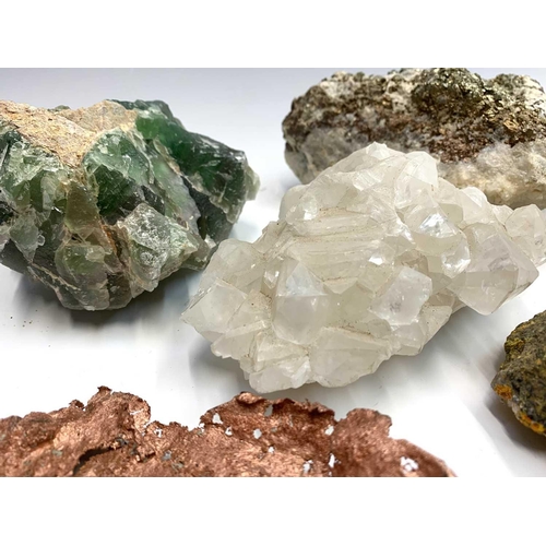 94 - An interesting collection of eight identified mineral specimens comprising, jasperised quartz on hem... 