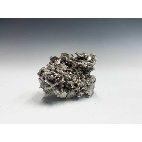 98 - An interesting collection of eight identified mineral specimens comprising, mica schist, stilbite, b... 