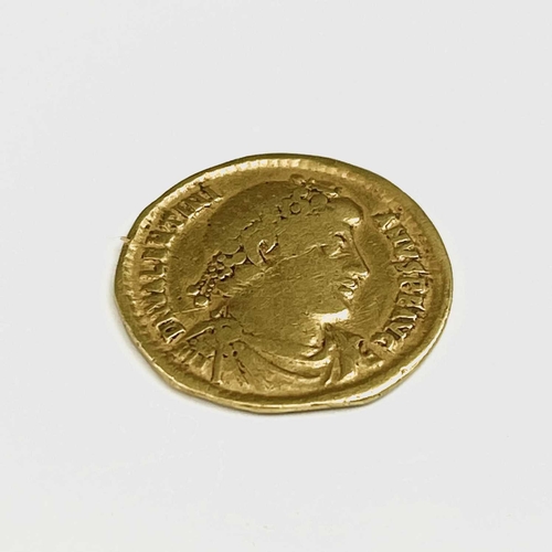 129 - Roman Empire, Valentinian I 364-75. Gold Solidus (2.02cm) weight 4.1 gms with illustration and resea... 