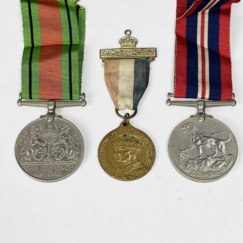 203 - G.B. World War II Medals (x7) etc. Lot comprises 7 medals: Defence Medal (x2), War Medal, 1939-45 St... 