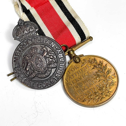 205 - World War I Metropolitan, etc. Police Medals and Badges. Lot comprises a Special Constabulary Long S... 