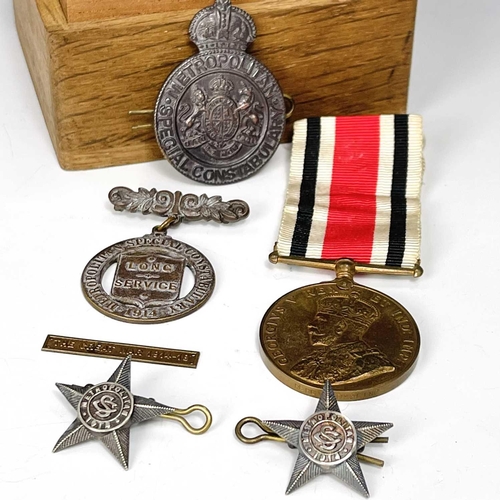 205 - World War I Metropolitan, etc. Police Medals and Badges. Lot comprises a Special Constabulary Long S... 